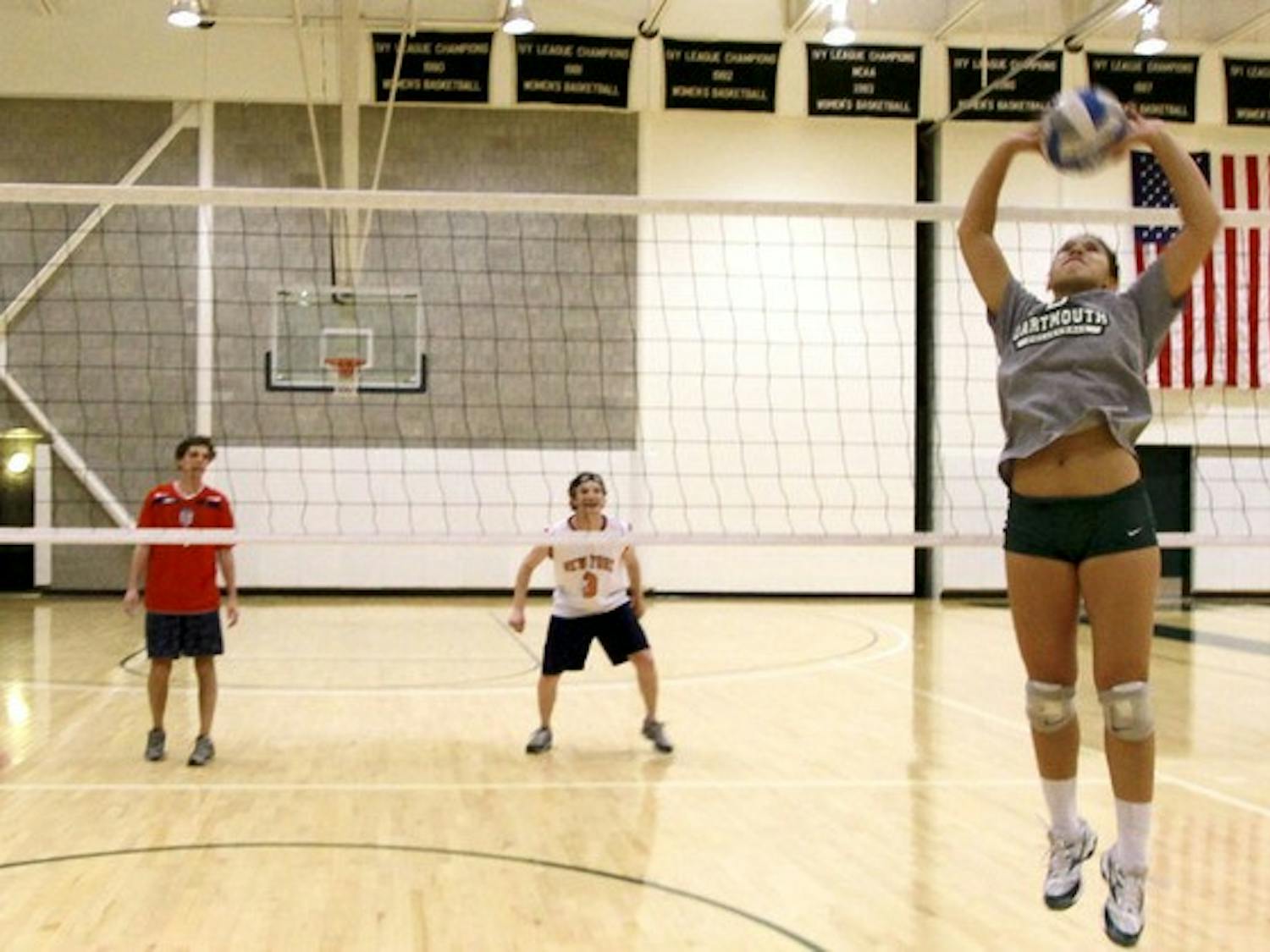 Tim Connor '13 prepares to get spiked in the face. Jonathan Katz '12 watches.
