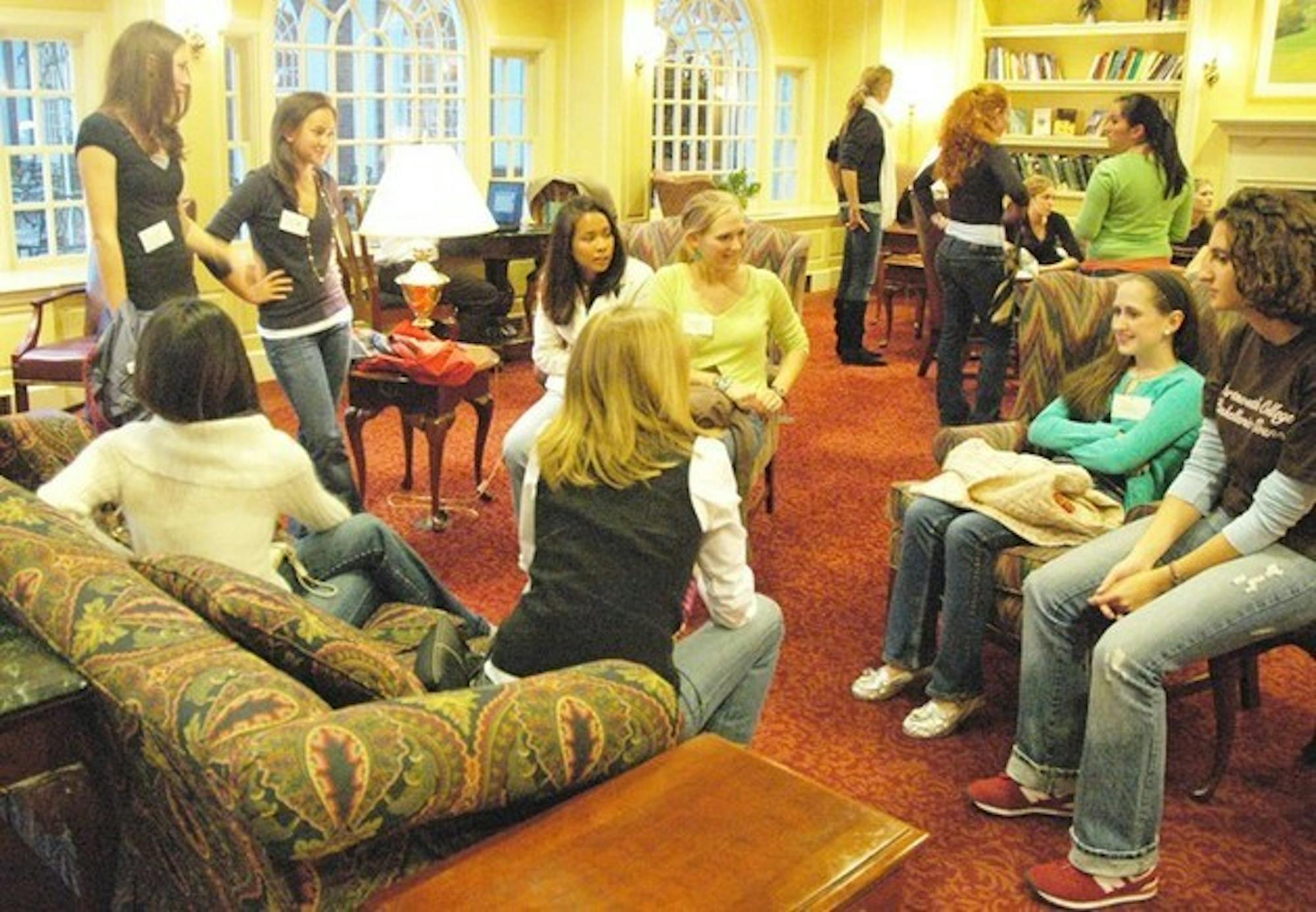 Sophomore girls gather at The Hanover Inn to meet sisters of the newly-created Alpha Phi sorority at rush Wednesday night.