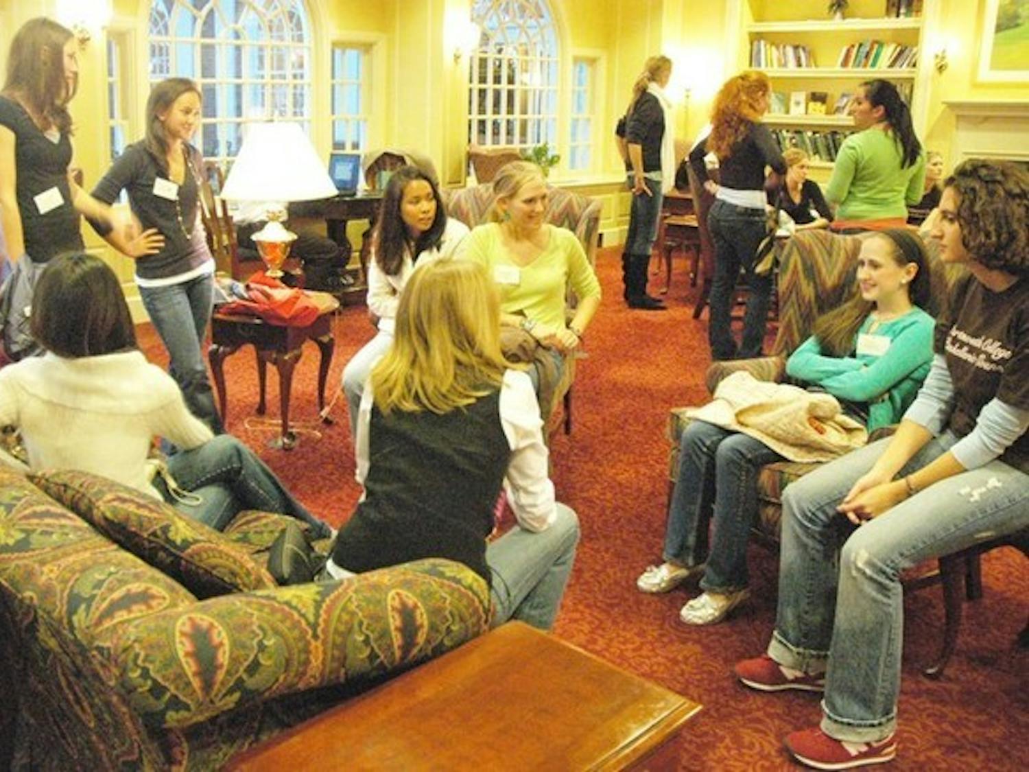 Sophomore girls gather at The Hanover Inn to meet sisters of the newly-created Alpha Phi sorority at rush Wednesday night.