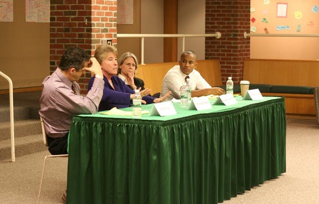 Professor Martin Favor, professor Annelise Orleck, Beth Robinson '86 and Jamal Brown '08 discuss gay rights in East Wheelock Residential Cluster on Friday afternoon.
