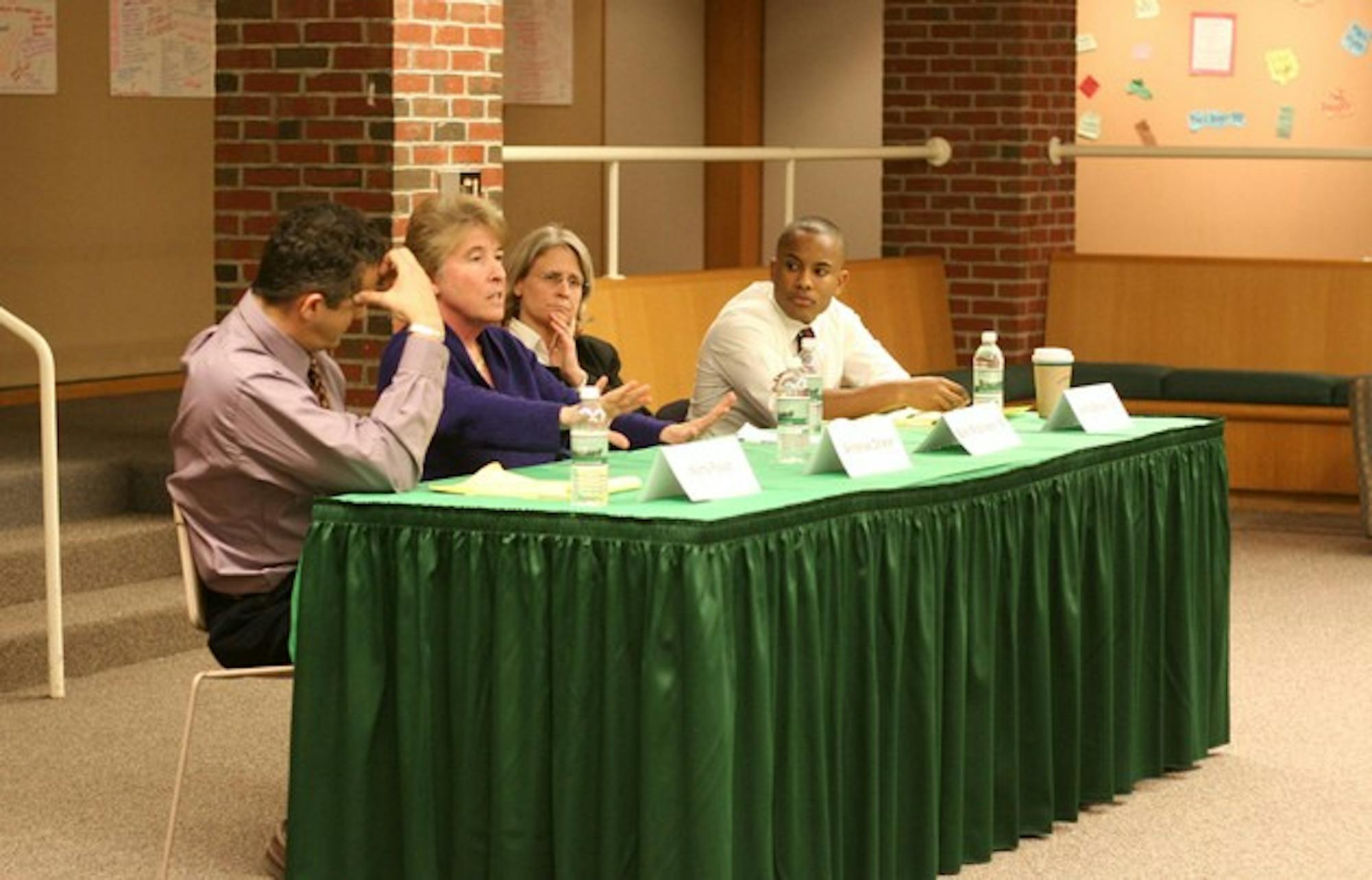 Professor Martin Favor, professor Annelise Orleck, Beth Robinson '86 and Jamal Brown '08 discuss gay rights in East Wheelock Residential Cluster on Friday afternoon.