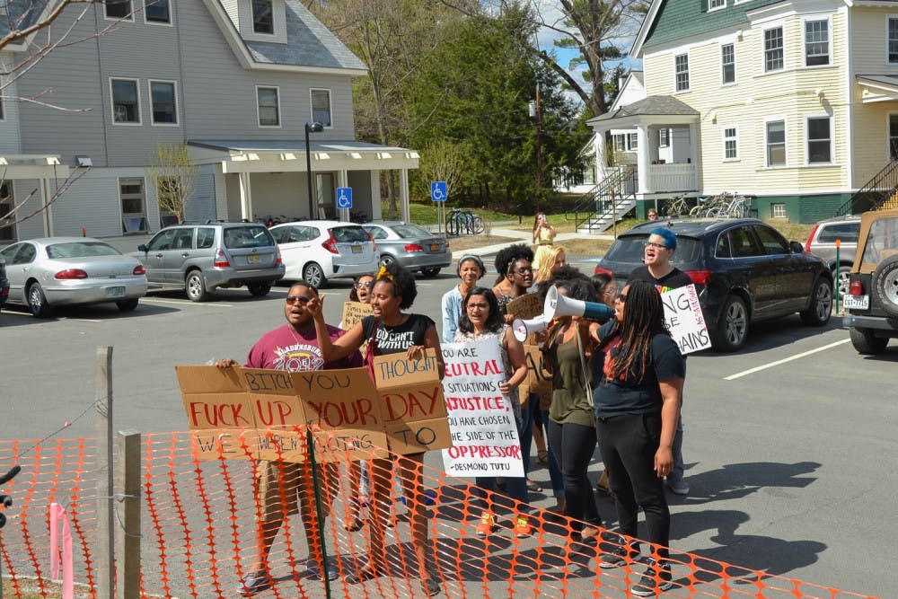 A group of students demonstrated outside of Alpha Chi Alpha fraternity's Pigstick event and Kappa Delta Epsilon sorority's Derby event Saturday afternoon. 