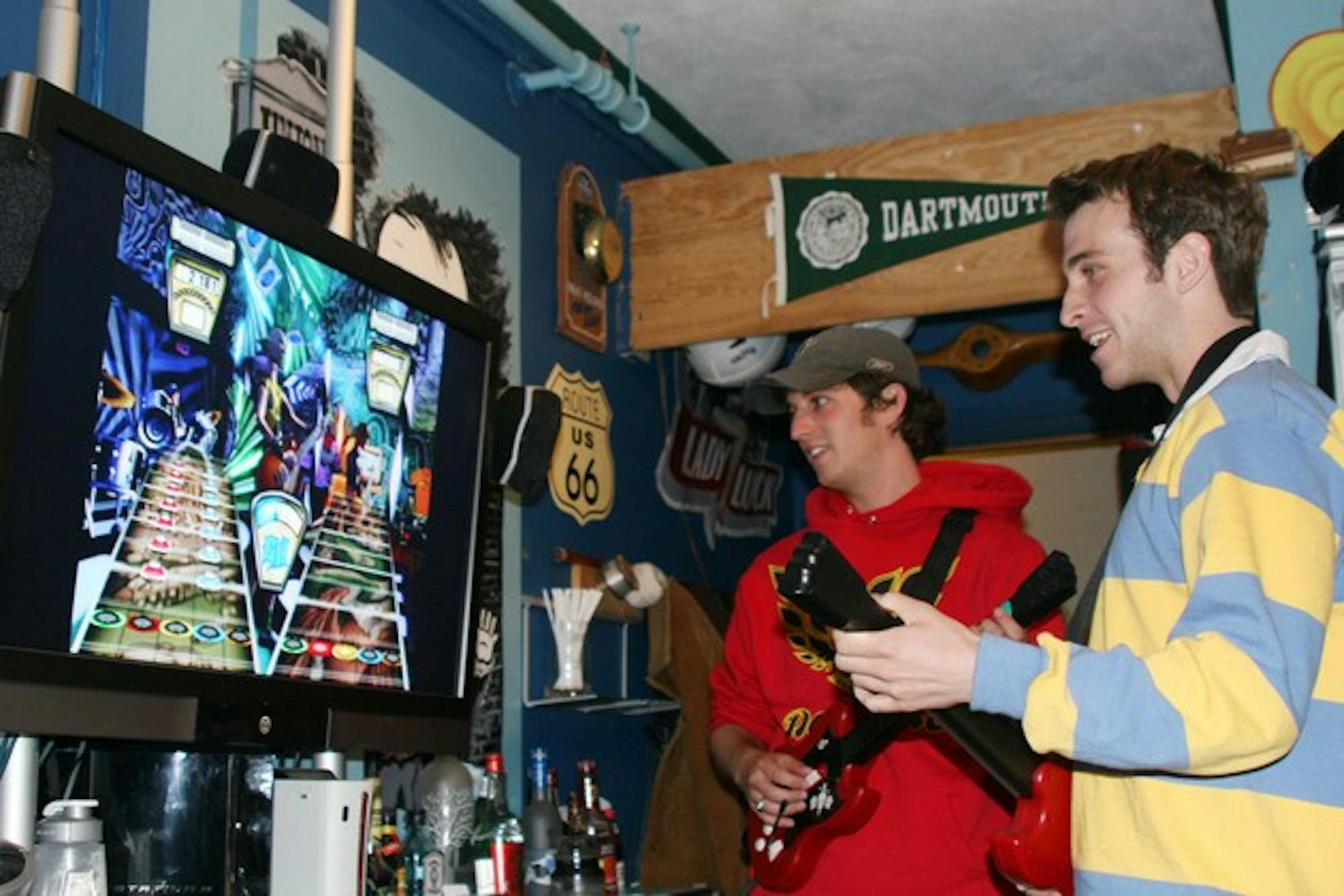Brian Christie '07 and Brian Lloyd '08 compete in multi-player mode, using separate guitar-shaped 