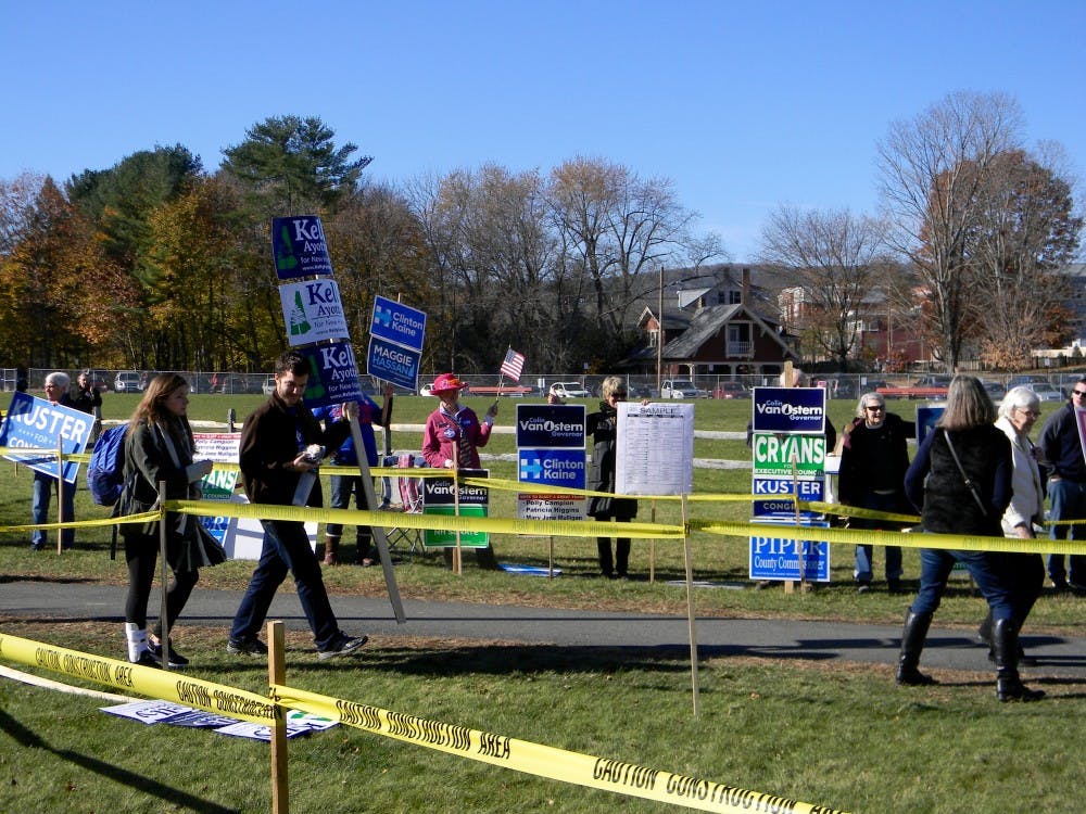 Last-minute campaigners turn out to canvass outside Hanover High School, supporting candidates up and down the ballot.&nbsp;
