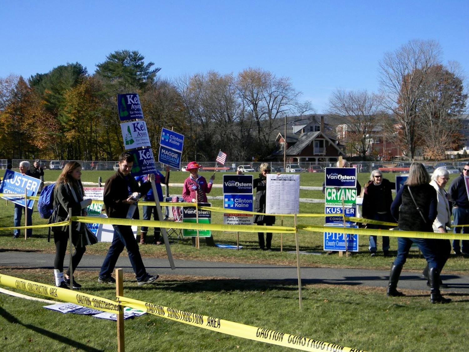 Last-minute campaigners turn out to canvass outside Hanover High School, supporting candidates up and down the ballot.&nbsp;