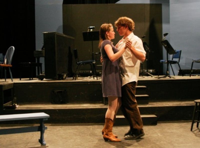 Elise Hogan '09 and Brendan Lynch-Salamon '10 dance during a rehearsal of 