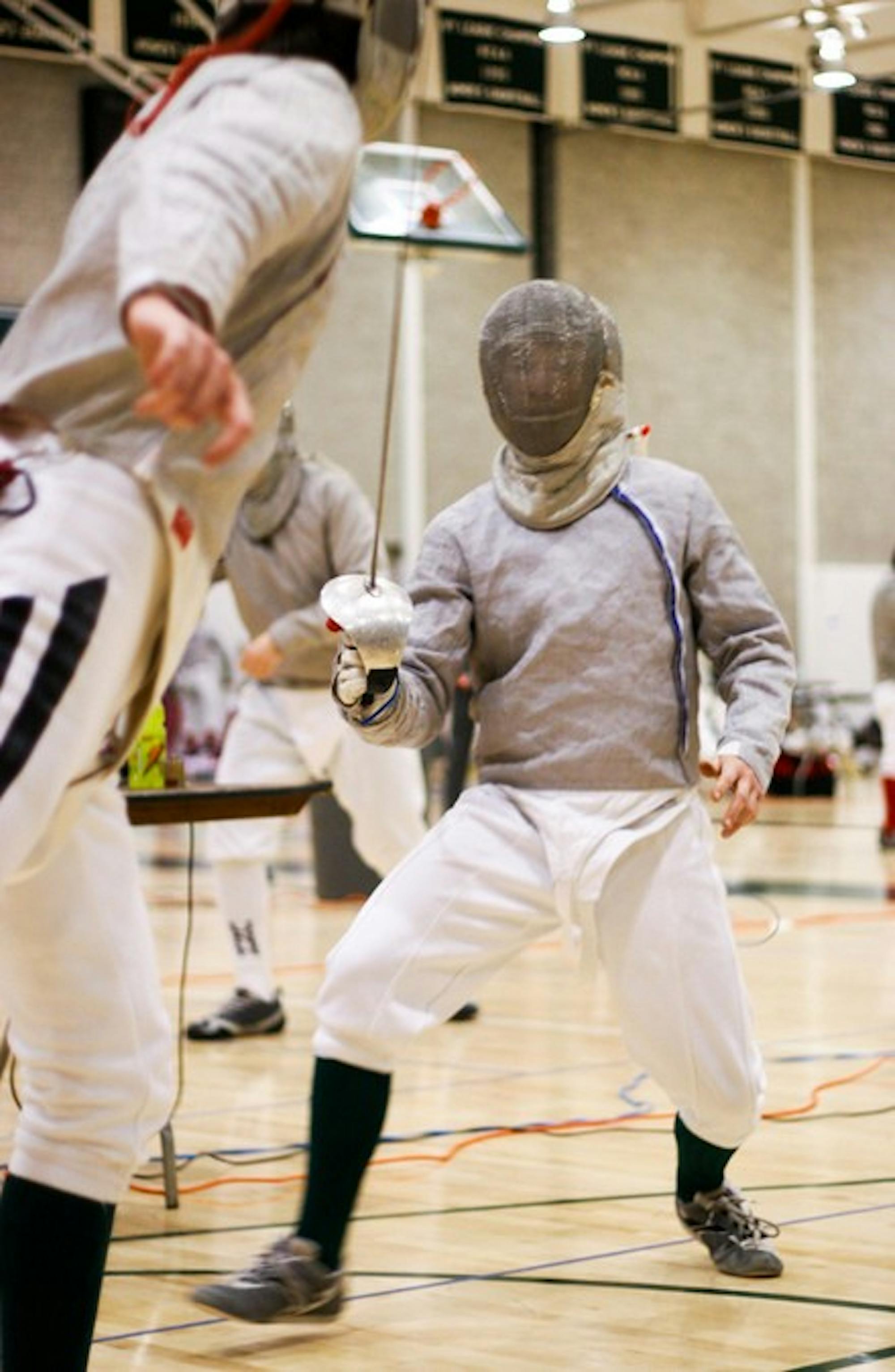 The men's club fencing team finished eighth in its 12-team draw but was finished second among club teams at the championship event.
