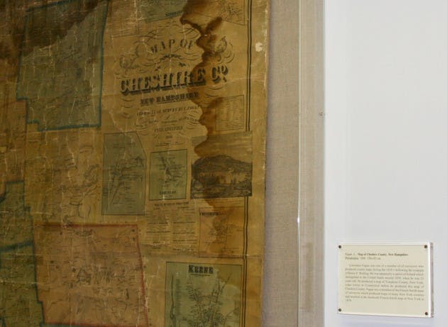 Maps from Barry MacLean '60's collection are displayed in Thayer School.