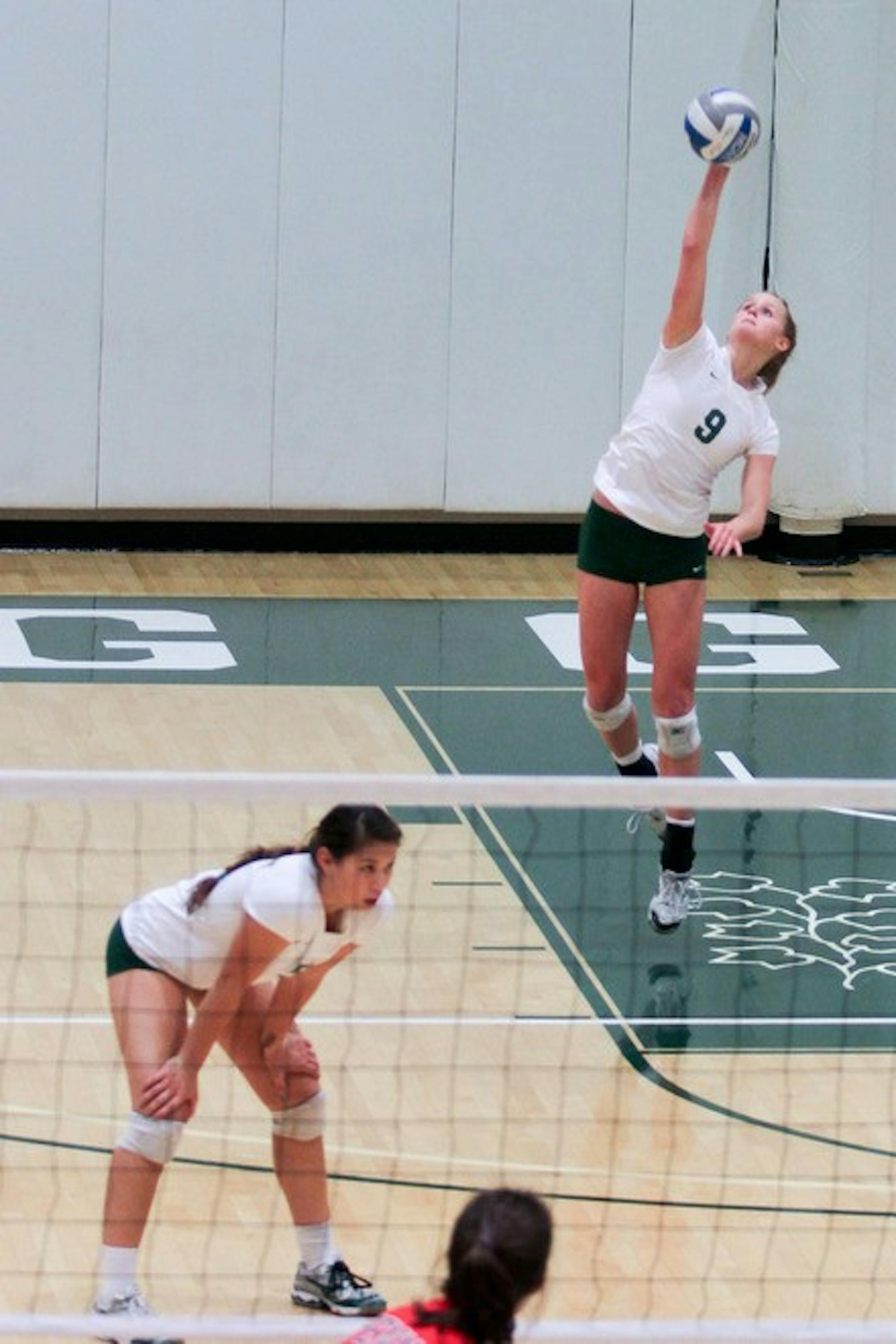 11.02.11.sports.volley.vert