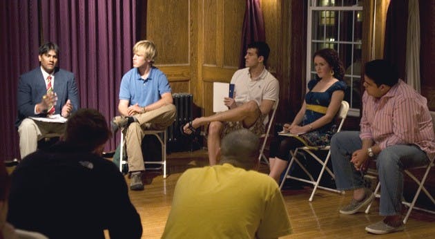 Student Assembly presidential candidates gather Thursday night at Sigma Alpha Epsilon fraternity for a debate centered on Greek issues.