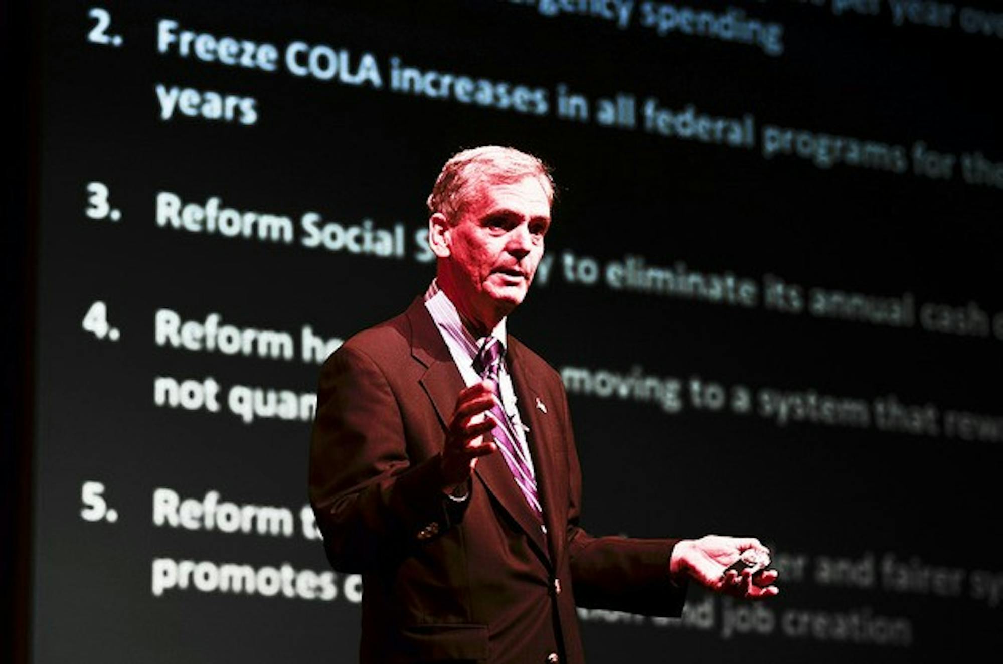 Judd Gregg explained the dangers of expanding federal budget deficits and national debt in a Wednesday lecture in Moore Theater.