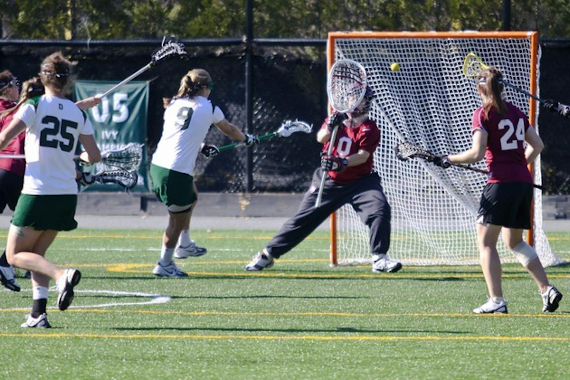 Bolstered by an unrelenting offense, including a goal by Sarah Plumb '12, the team cruised to a 13-6 victory.