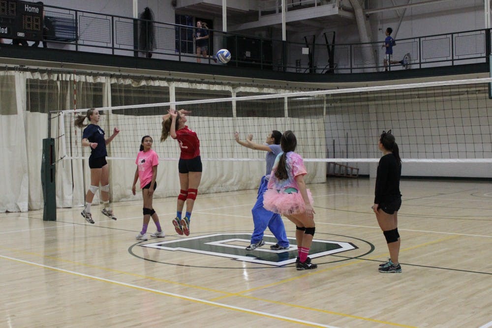 Women's club volleyball practices three times a week.