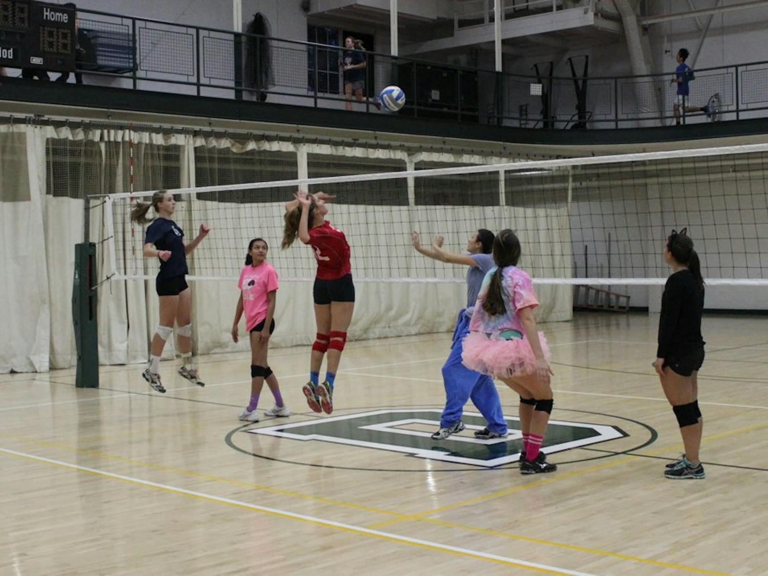 Women's club volleyball practices three times a week.