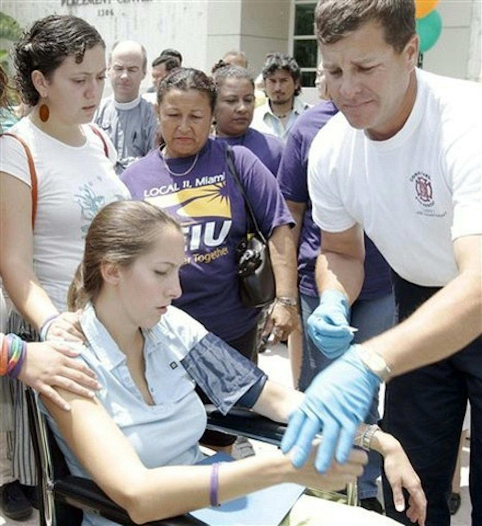 University of Miami student Tanya Aquino, who has been on a hunger strike to support school janitors, was hospitalized Tuesday, April 18.
