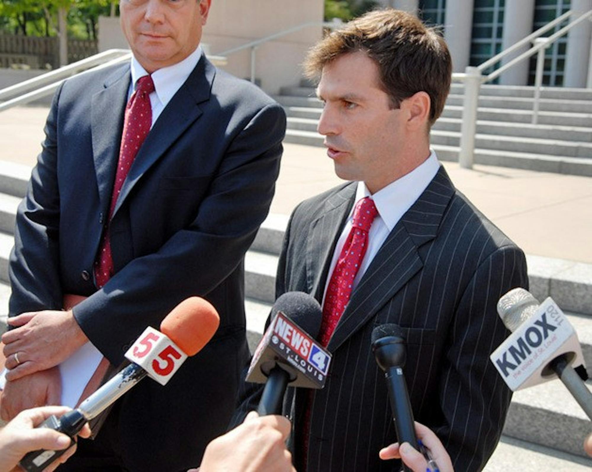 Former Missouri State Senator Jeff Smith (center), 37, speaks with members of the media on the steps of the Thomas F. Eagleton United States Courthouse in St. Louis Tuesday, Aug. 25, 2009. Smith plead guilty to two counts of conspiracy to obstruct justice in relationship to an investigation of his losing 2004 run for Congress. Smith resigned his seat in the state senate today. At left is attorney Richard Greenberg. (AP PHOTO/Sid Hastings)
BC-MO--Lawmakers-Investigation