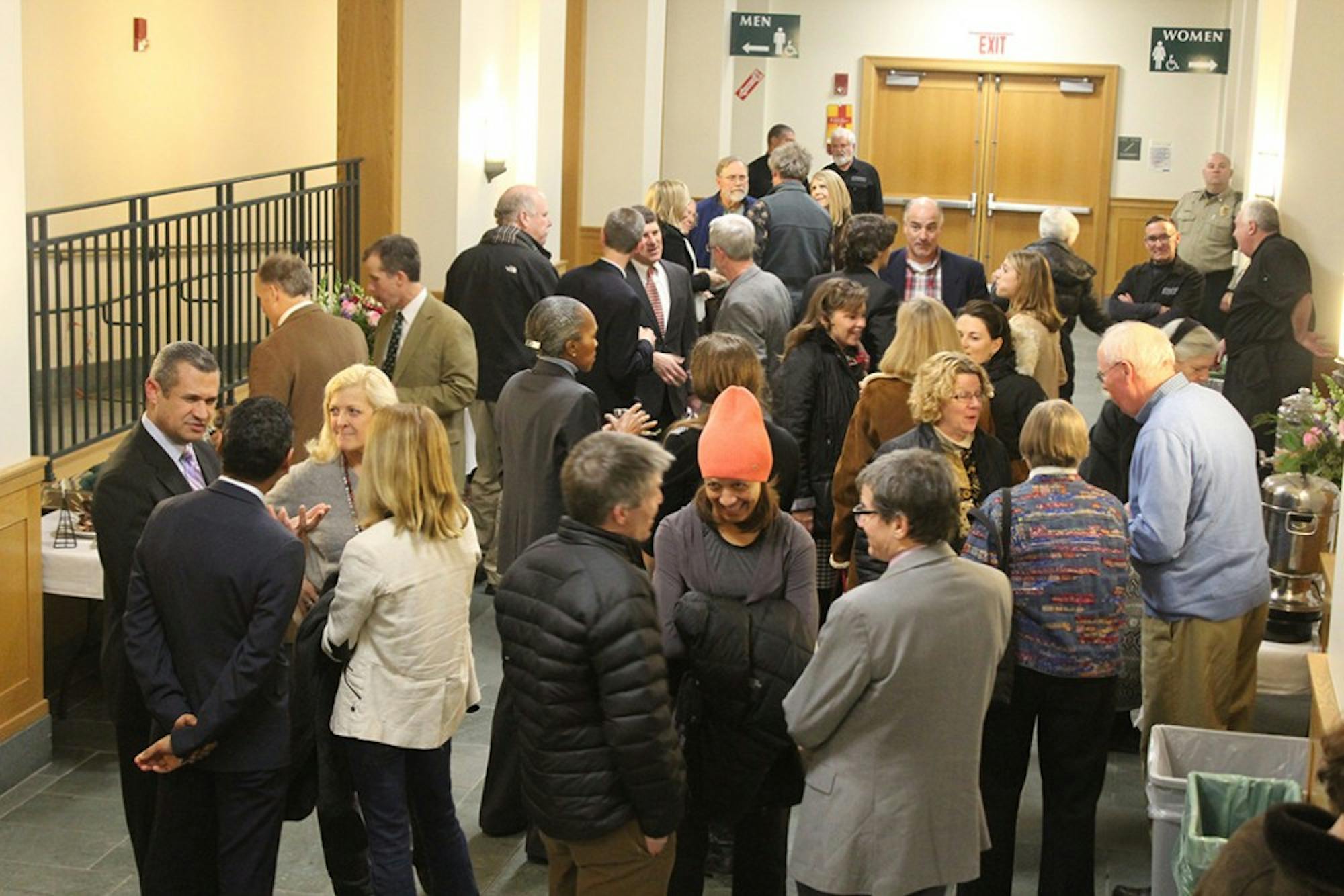 Attendants mingle outside the awards at the following reception.