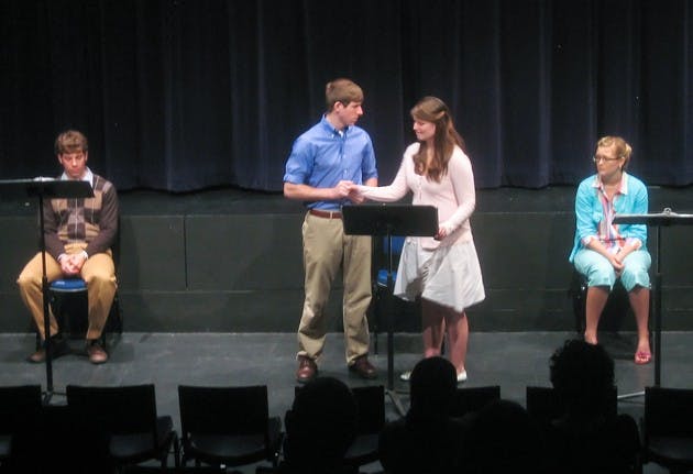 Students participate in a staged reading of 