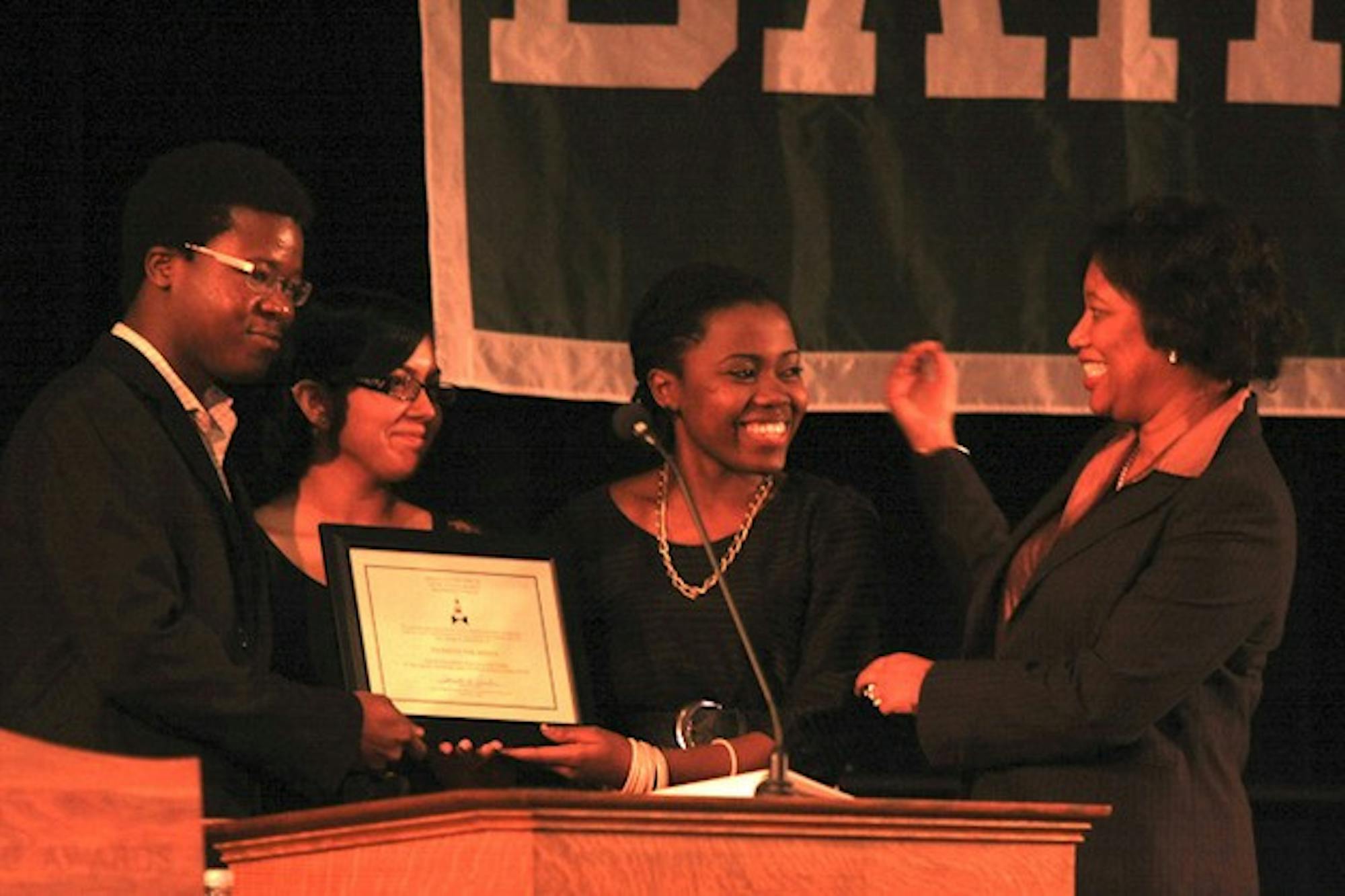 Four Dartmouth alumni and the student group Students for Africa were recognized for their social justice work on Friday.