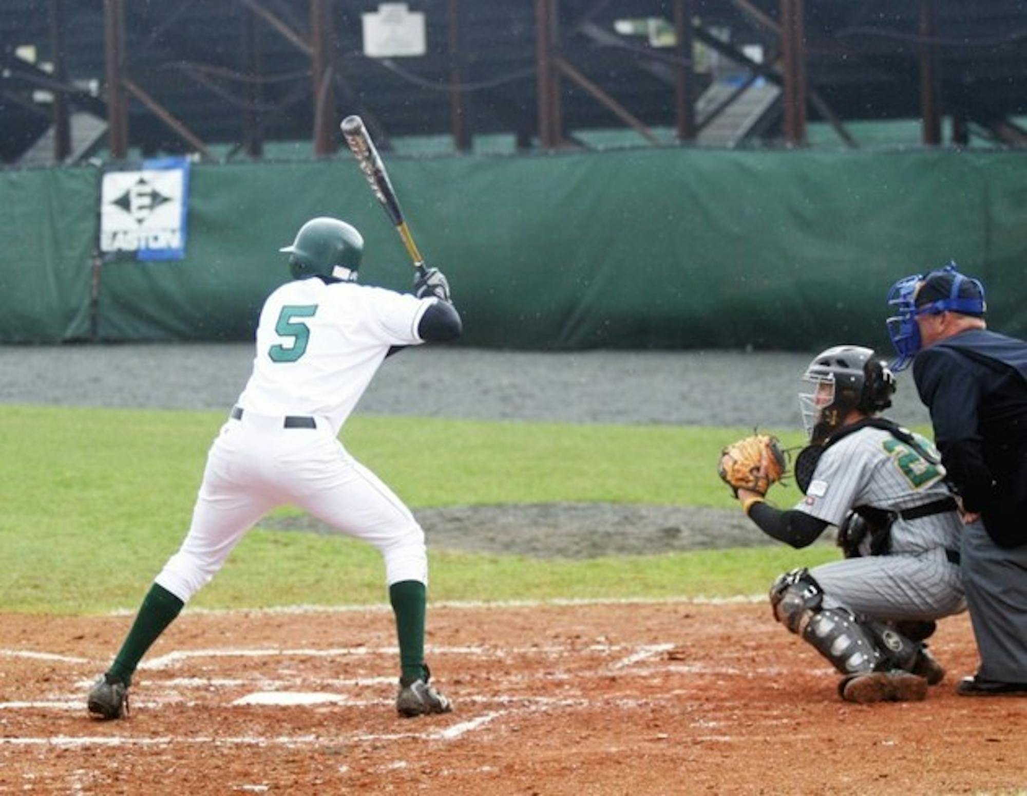 After agreeing to change his position and swing and surrender his hoop dreams, Damon Wright '08 has become one of Dartmouth's most productive hitters.