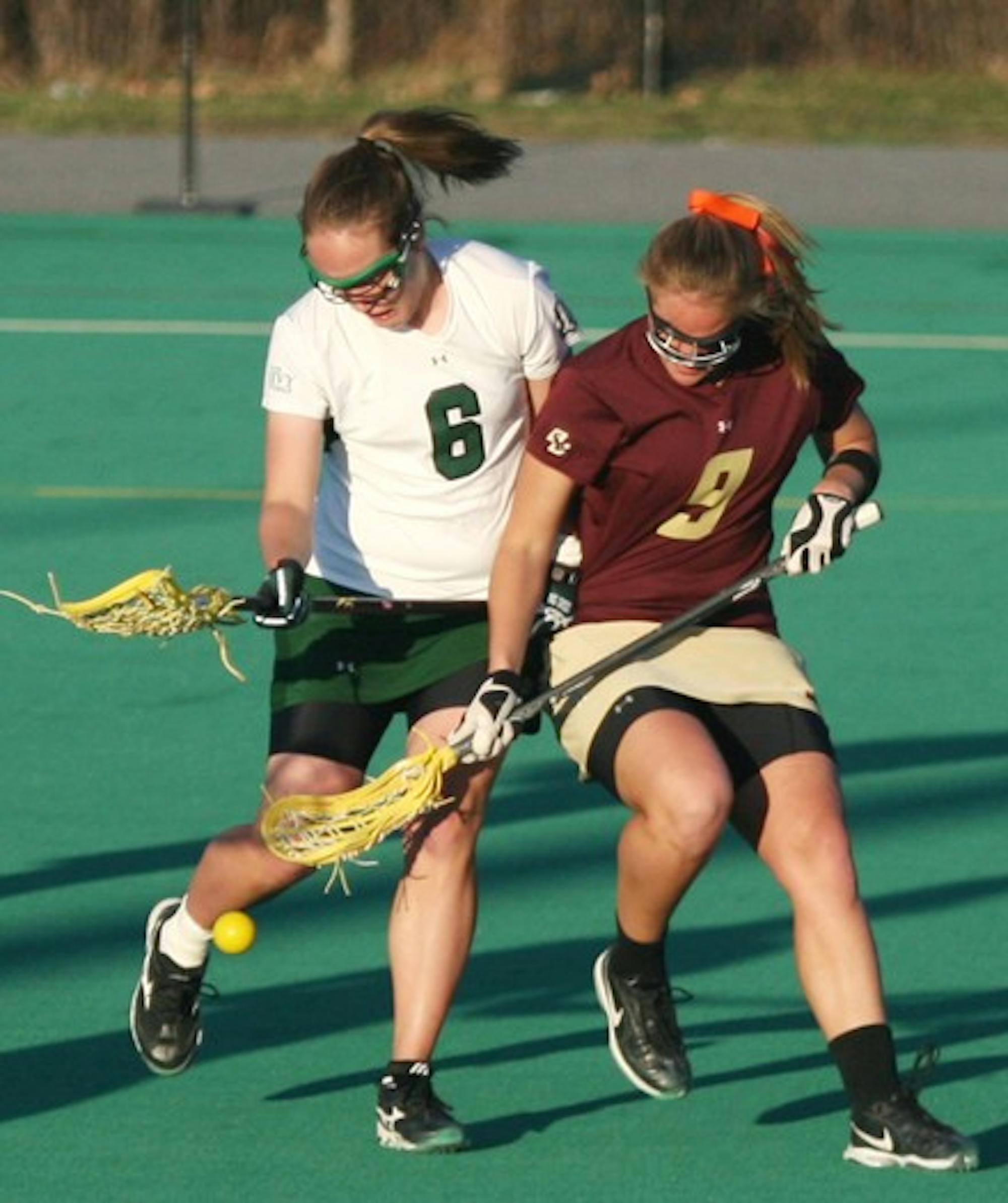 Colleen Olsen '10 battles for a ground ball in Tuesday's 13-9 victory.