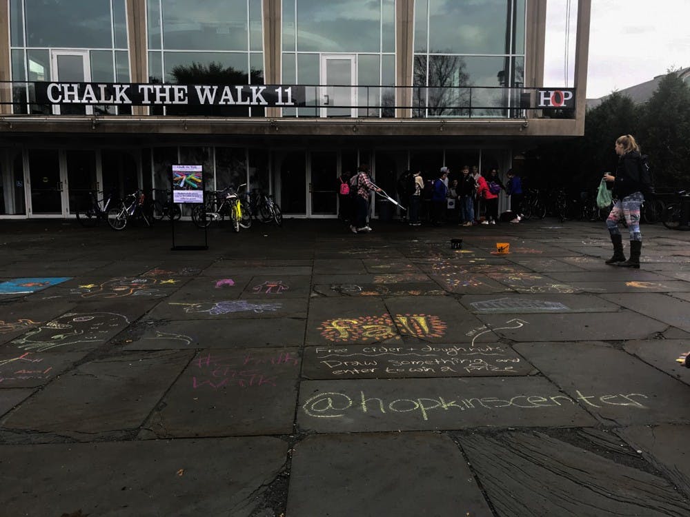 A Hop event for student art and art appreciation on campus. Sidewalk chalk, cider, donuts and raffles provided.