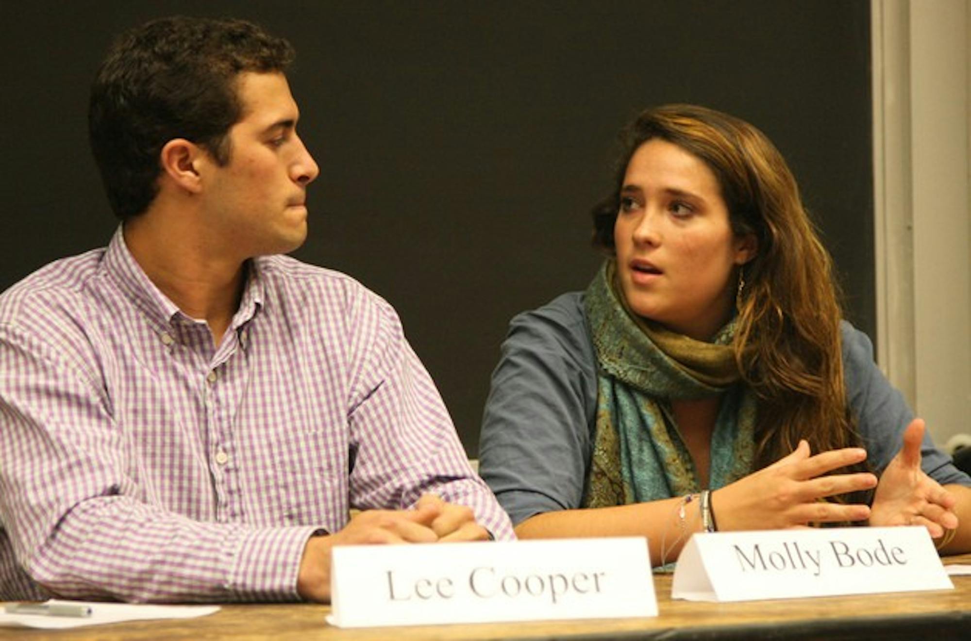 Student Assembly presidential candidates Lee Cooper '09 and Molly Bode '09 present their platforms at the Student Assembly's first candidate debate.