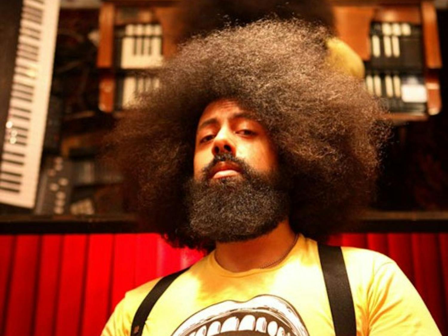 Popular comedian Reggie Watts, who will perform this Saturday night, has given a TED talk and created a parody of Radiohead.