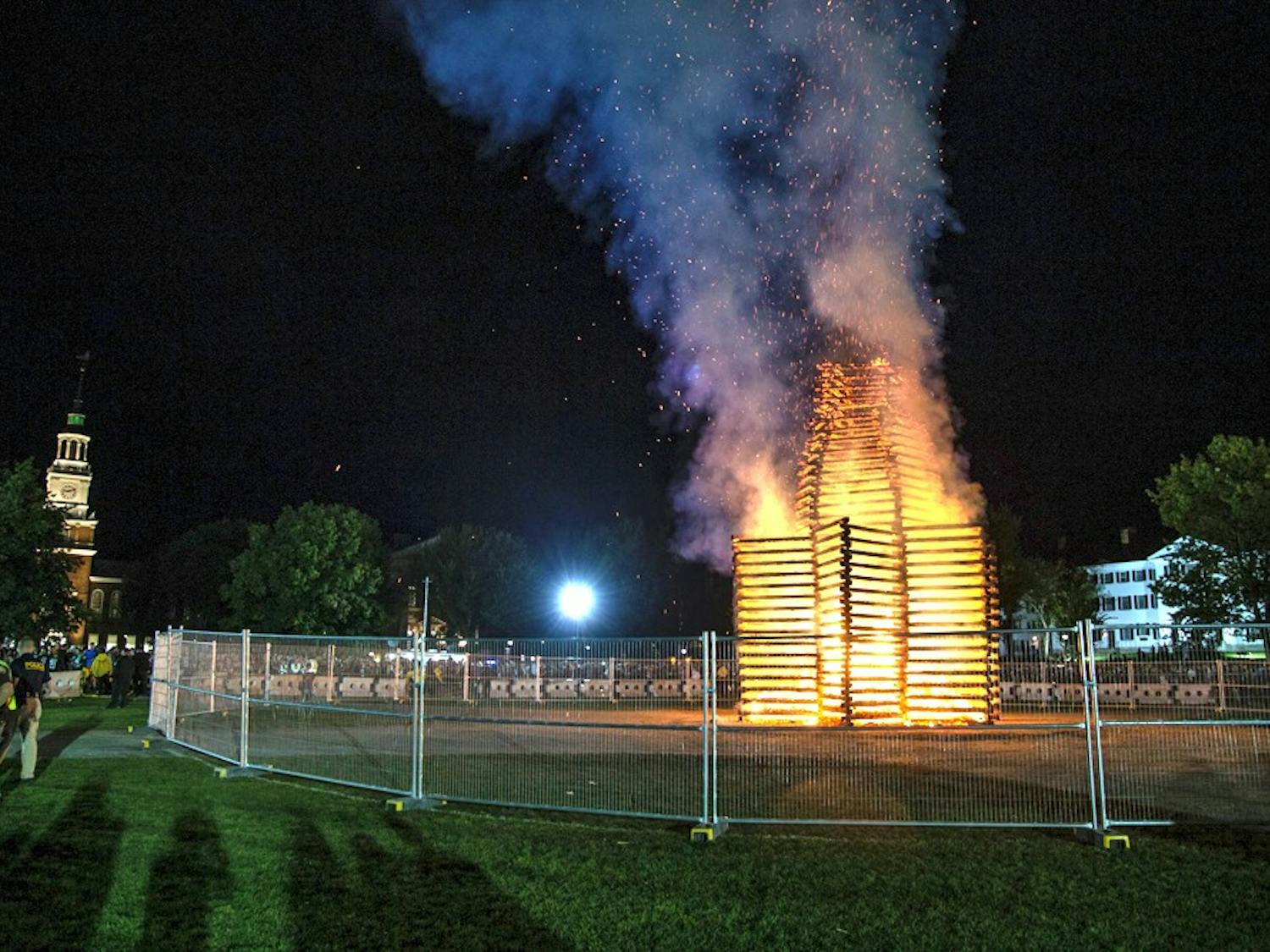 The College installed a fence around the Homecoming bonfire after about 50 students touched the fire in 2016.