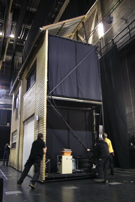 A two-story house accompanies the second tableaux in Henier Goebbels' musical staging of classic texts, which was performed at Dartmouth this weekend.