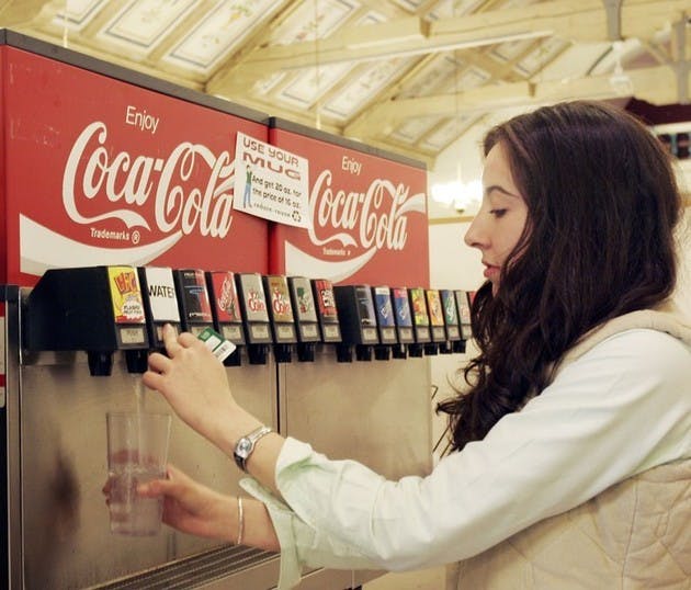 Nadia Khamis '07 grabs a drink at Food Court, one of many DDS locations disrupted by a large amount of flooding due to a construction mishap.