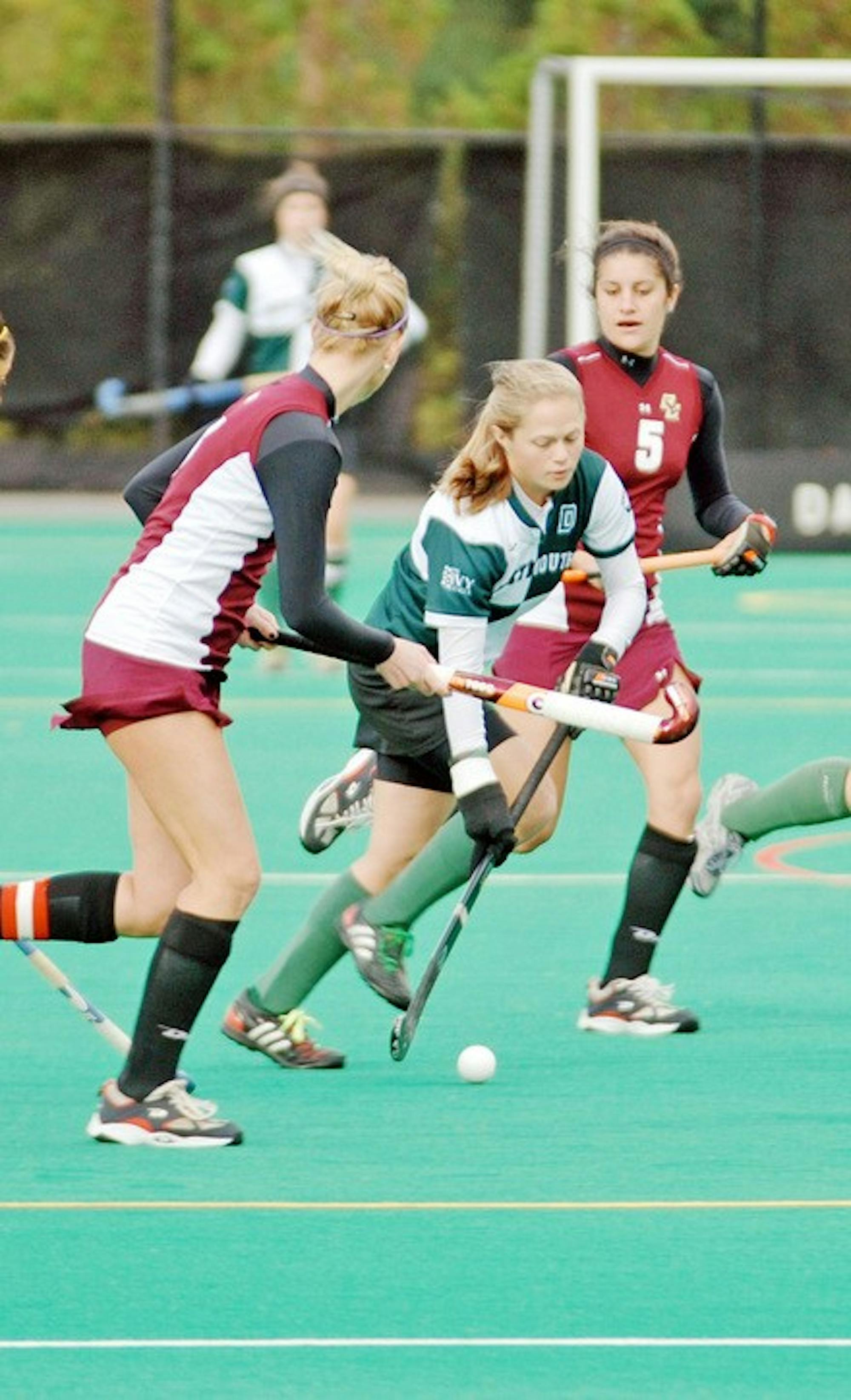 Allison Weinstock '10 maneuvers through the defense with the ball.