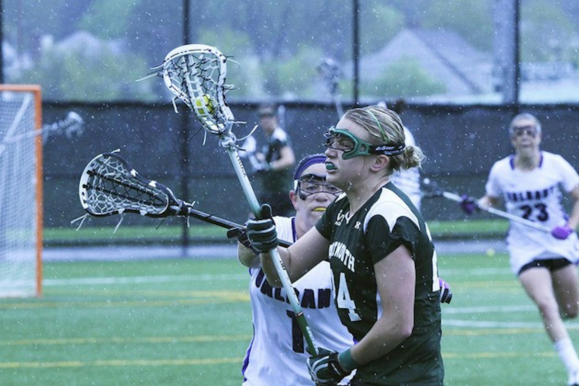 Women's lacrosse held off a second-half comeback by Brown University to secure the team's third conference victory of the season.