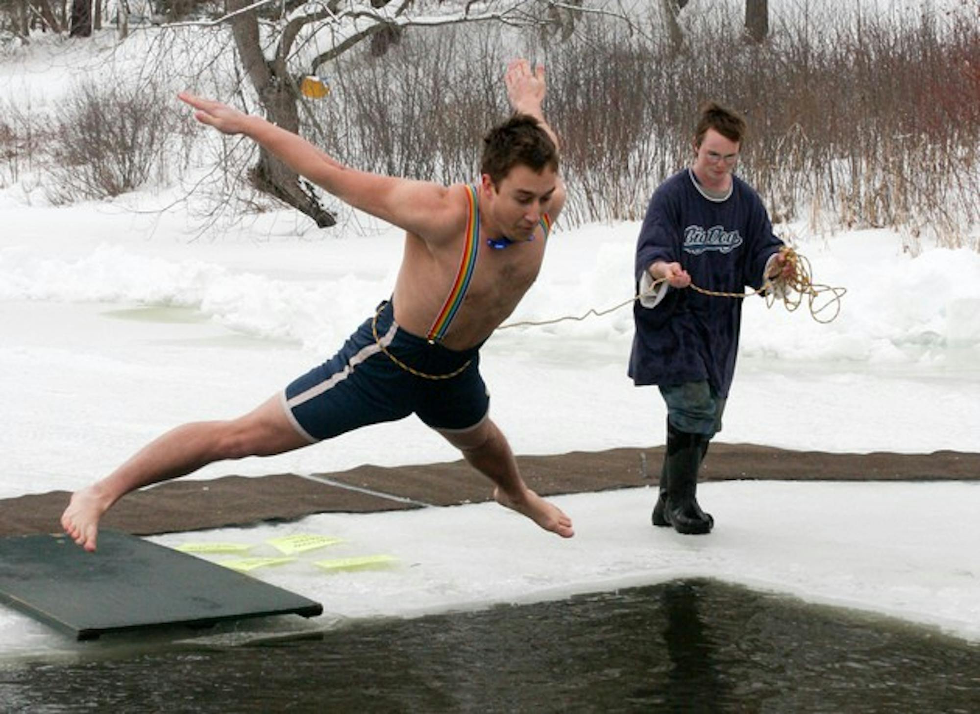 Jon Sheller '09 takes the plunge into a frigid Occom Pond during Winter Carnival's annual Polar Bear Swim, which was held on Friday.