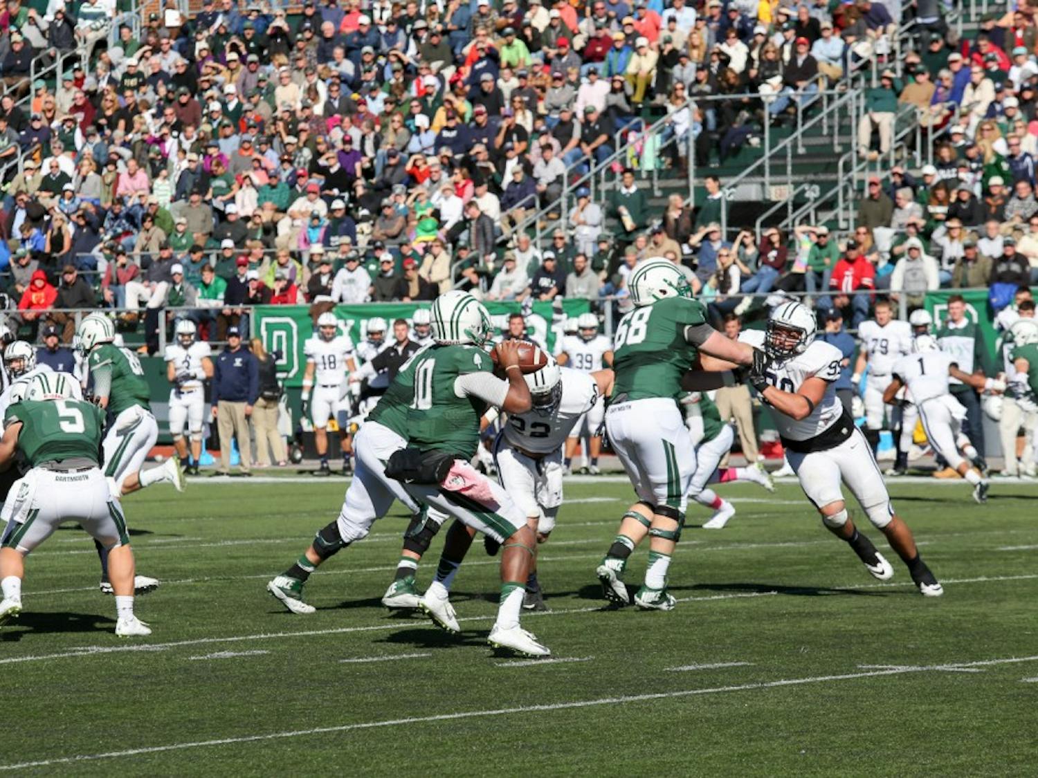 Football coach Buddy Teevens utilizes tackle-free practices to keep players safe.