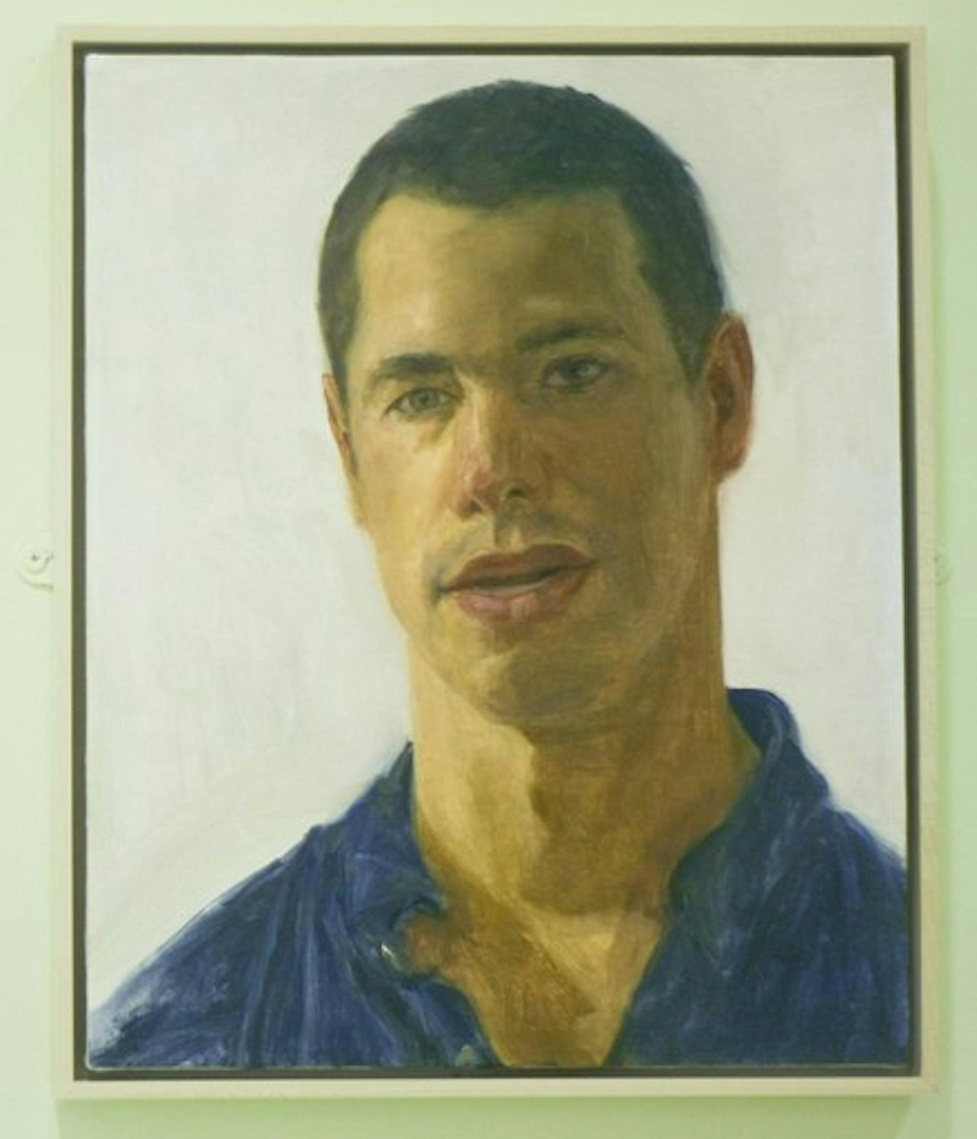 Felix de la Concha's portrait of Andrew Zabel '09 hangs in the main hall of Baker Library.