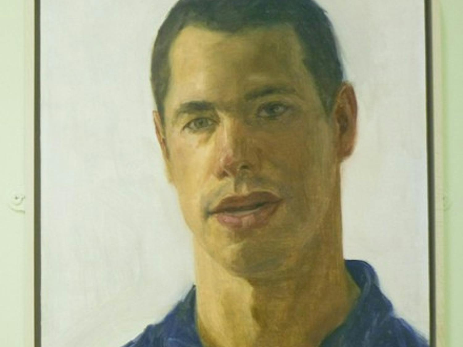 Felix de la Concha's portrait of Andrew Zabel '09 hangs in the main hall of Baker Library.