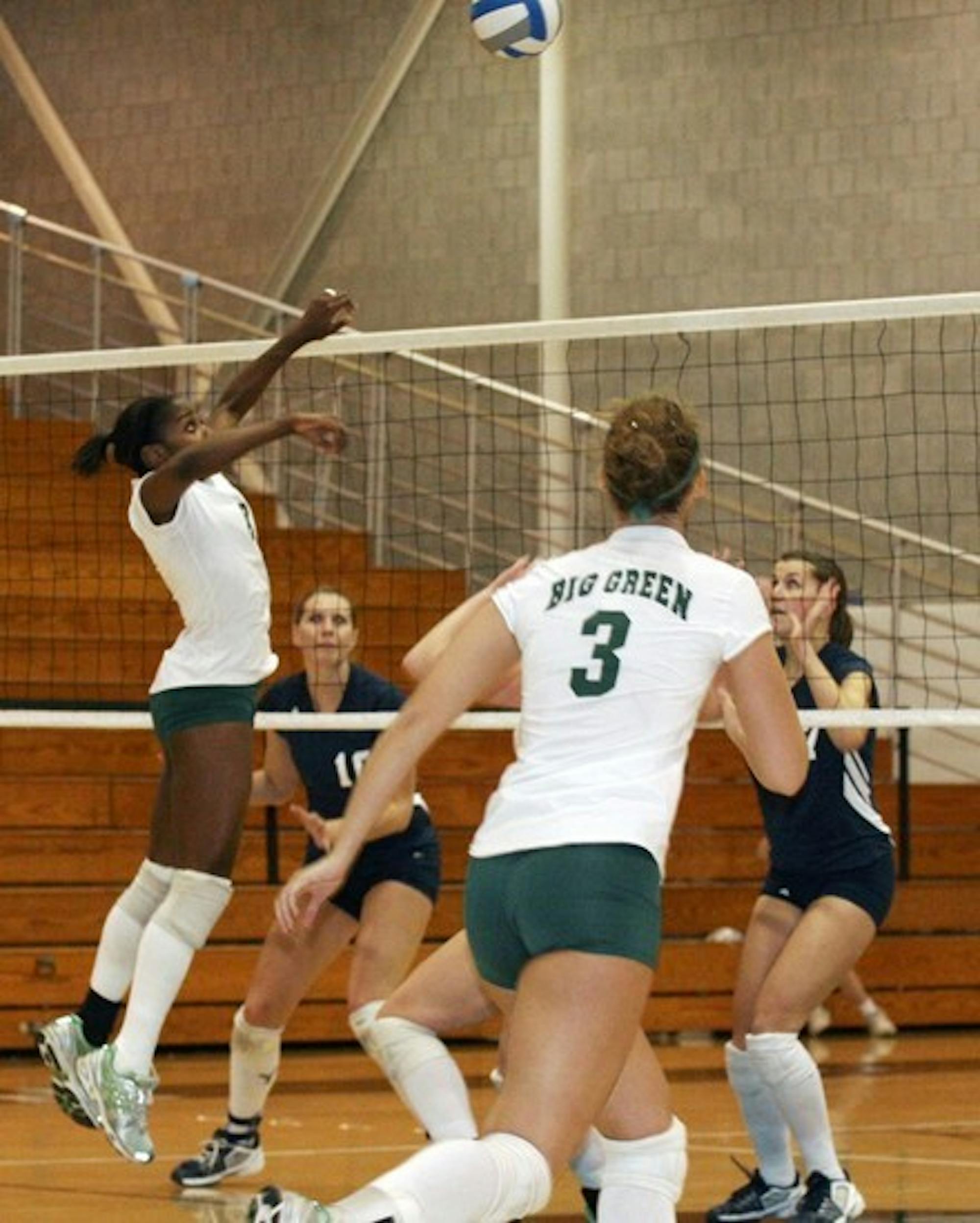 Middle blocker Nadine Parris '06 (left), Dartmouth's only graduating senior, will play her final two matches at Leede Arena next weekend.