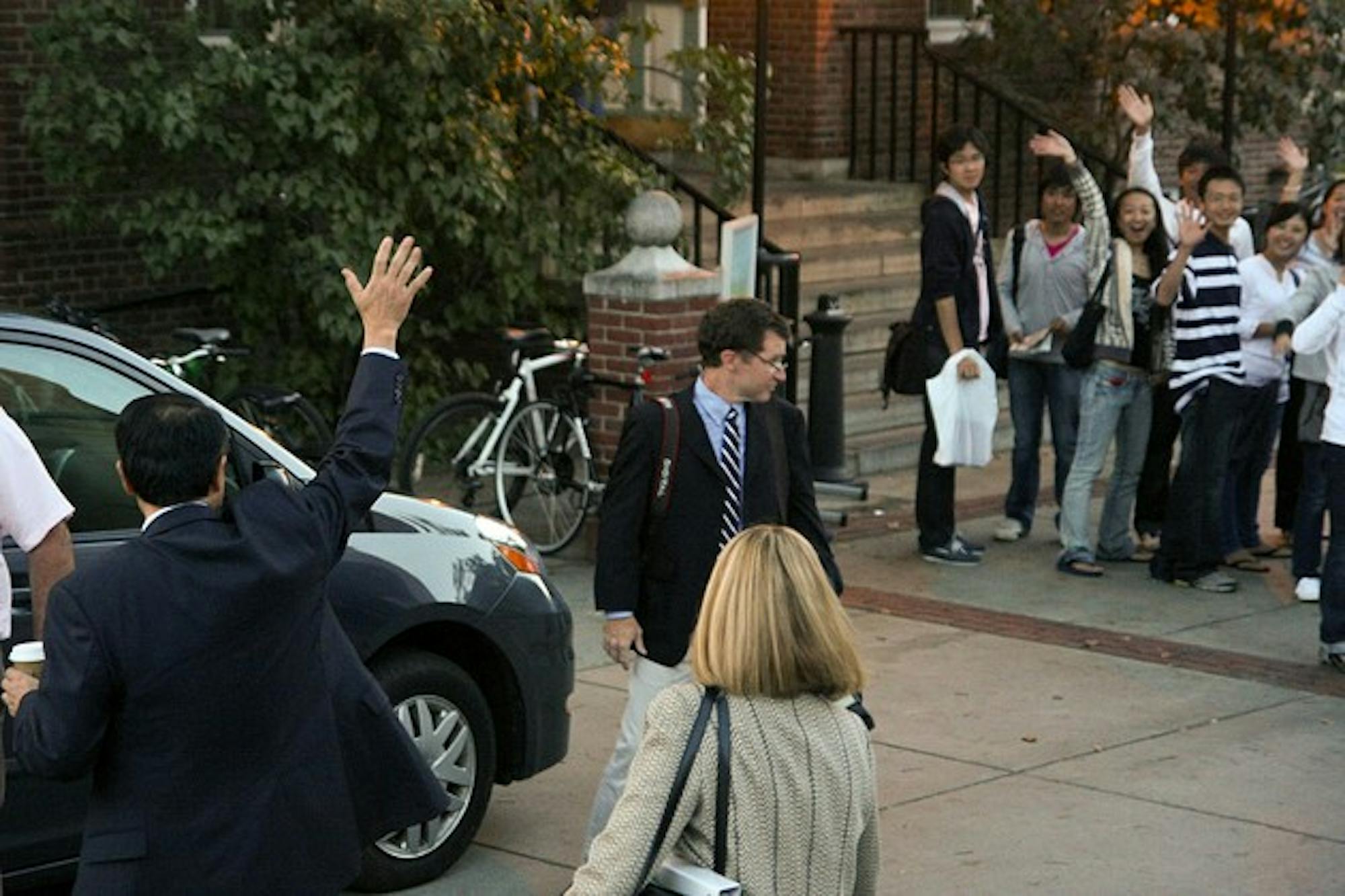 College President Jim Yong Kim waves to students on Monday night after an inauguration event.