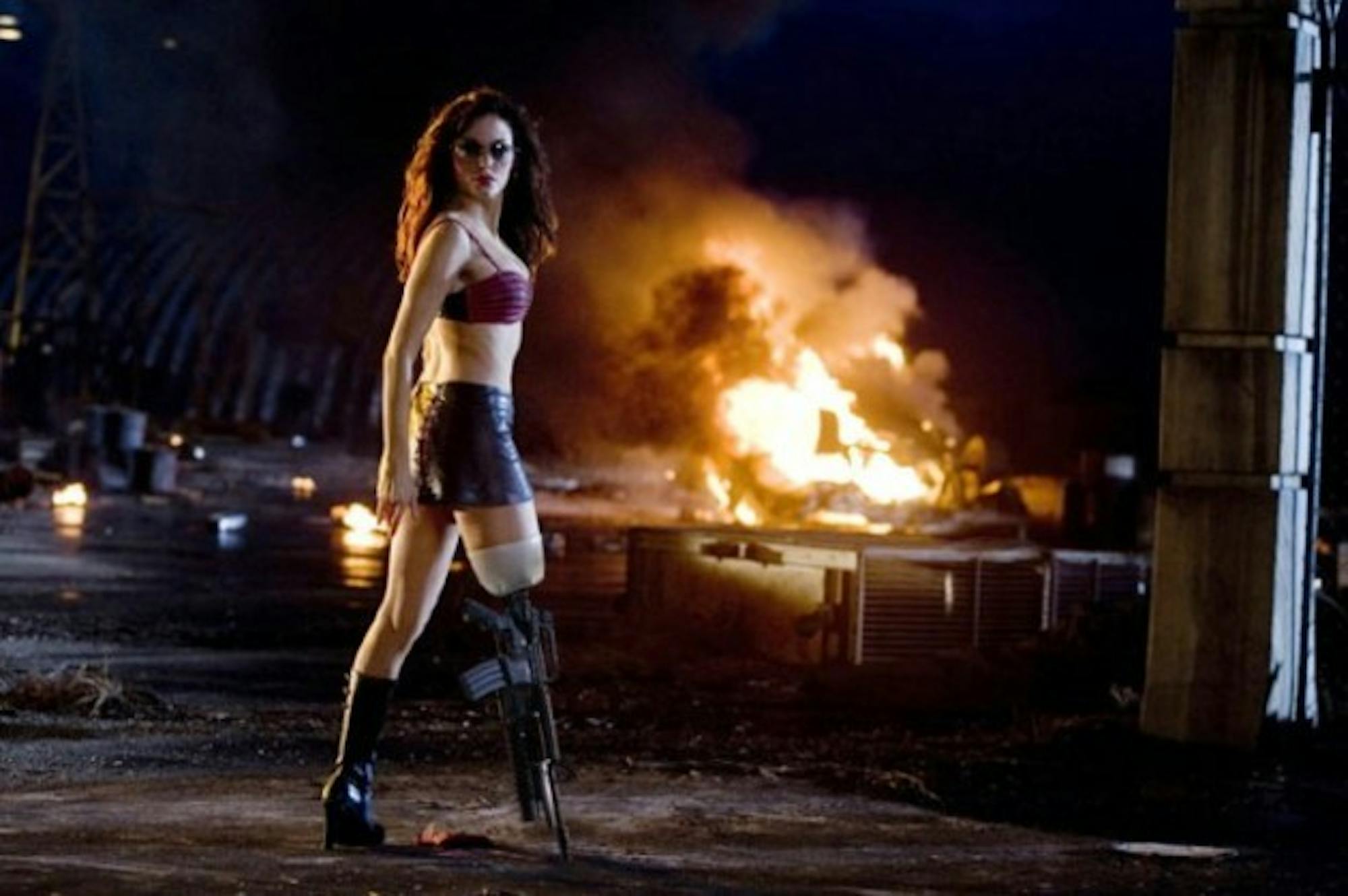 Rose McGowan shows off her assets as Cherry, a stripper-turned vigilante in Robert Rodriguez's 