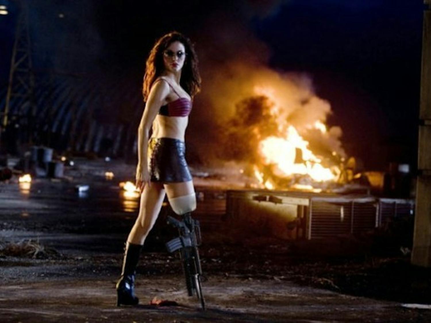 Rose McGowan shows off her assets as Cherry, a stripper-turned vigilante in Robert Rodriguez's 