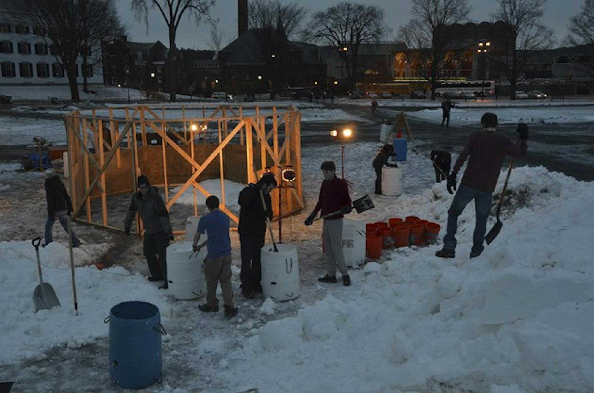 Volunteers have started constructing the Winter Carnival snow sculpture, which this year will take the form of a cupcake, reflecting the 