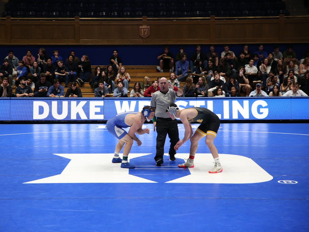 Duke wrestling competes in Cameron Indoor Stadium. 