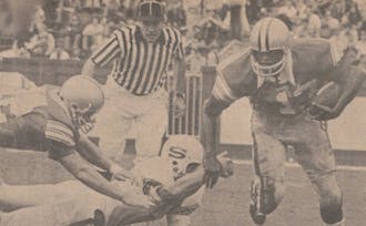 Ernie Jackson earned All-American honors his senior year as a cornerback and tailback, playing both offense and defense.
