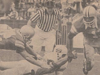 Ernie Jackson earned All-American honors his senior year as a cornerback and tailback, playing both offense and defense.