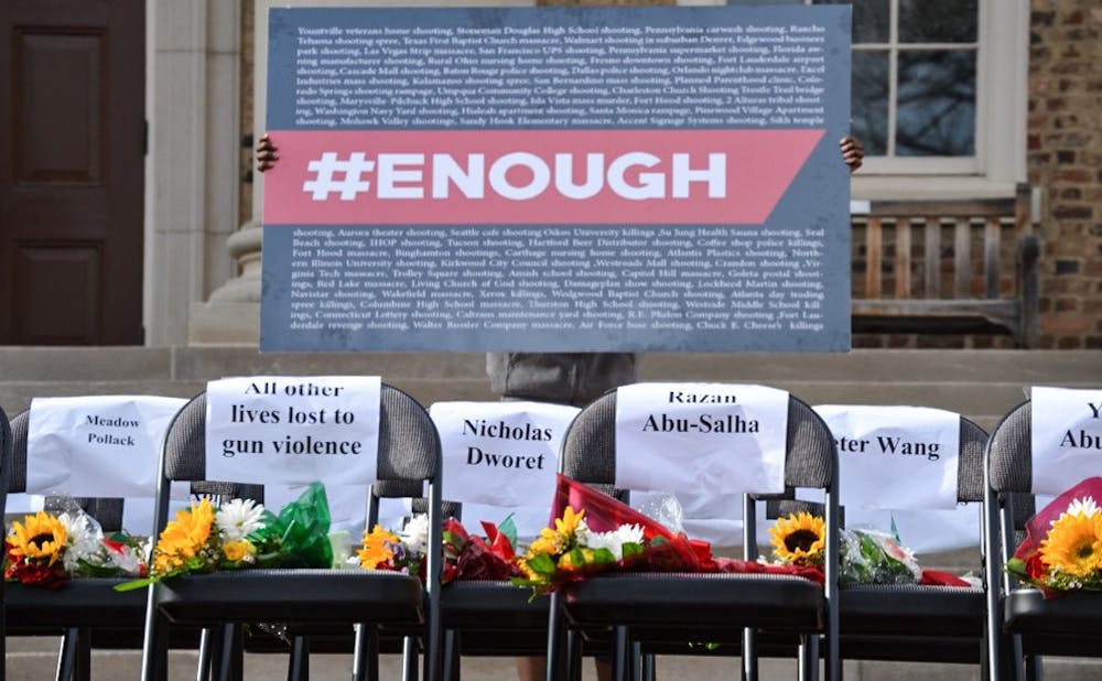 <p>The #Enough sign includes the names of the recent shootings in America.</p>