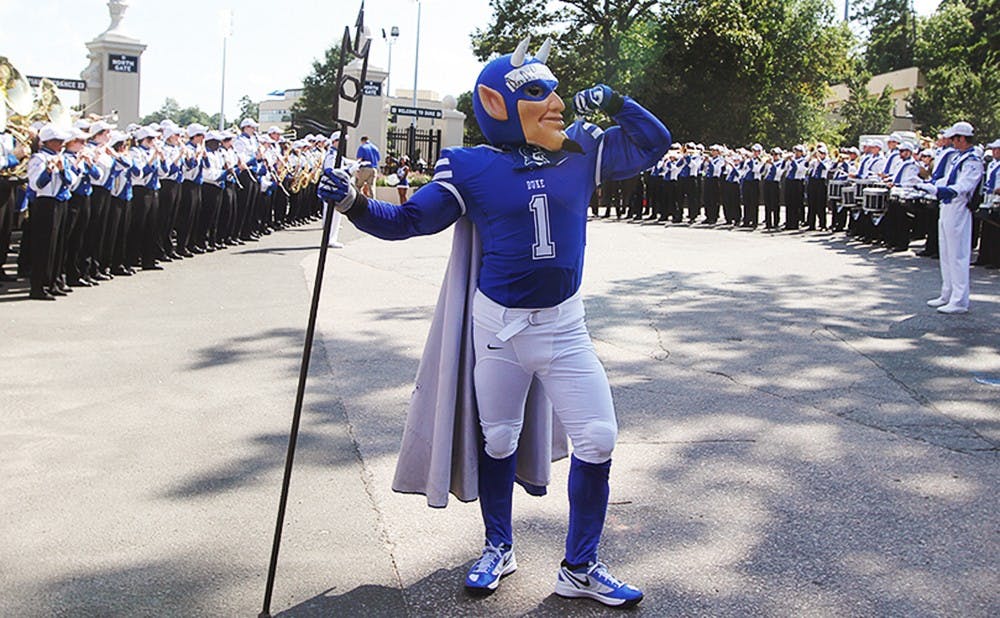 The Blue Devil poses nearby Wallace Wade  Stadium, where about 250 students gathered for DevilsGate before the football game against Kansas on Saturday.