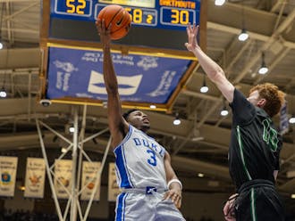 Jeremy Roach lifts the ball over a Dartmouth defender in Duke's Monday win.