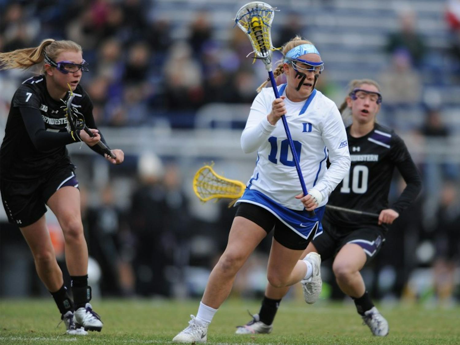 Sophomore Kyra Harney scored two goals Saturday night, but No. 18 Southern California forced the Blue Devils into 14 turnovers and kept Duke scoreless for long stretches in an 11-5 Trojan victory.