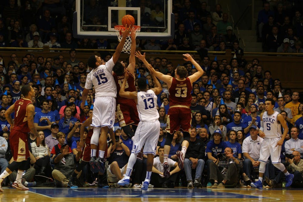 Jahlil Okafor finished with a career-high 28 points in the first ACC game of his career as Duke routed Boston College.